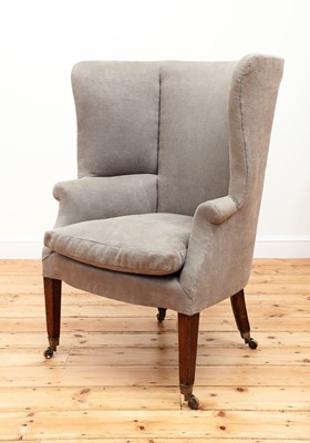 Lot 655 - A small George III wingback armchair