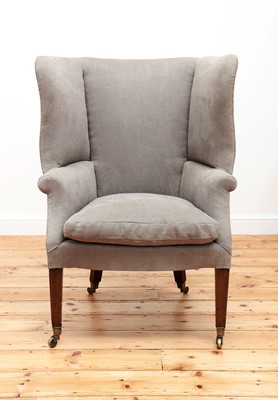 Lot 655 - A small George III wingback armchair