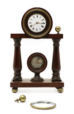 Lot 144 - A mahogany portico clock