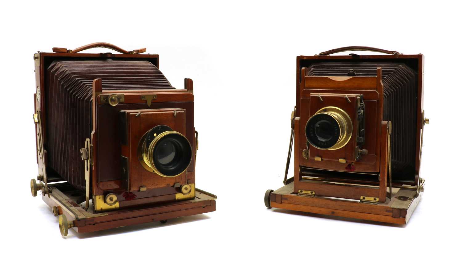 Lot 98 - Two Thornton Pickard patent mahogany bellow plate cameras