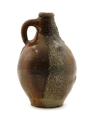 Lot 126 - A stoneware bellarmine jug