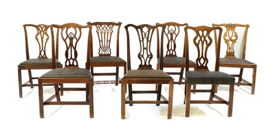 Lot 407 - A mixed set of seven George III mahogany dining chairs