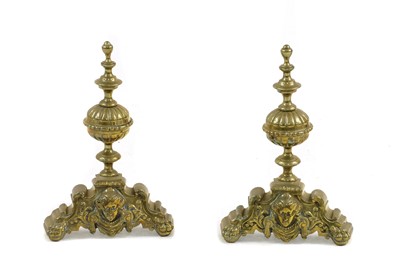 Lot 144 - A pair of 17th century style Dutch brass andirons