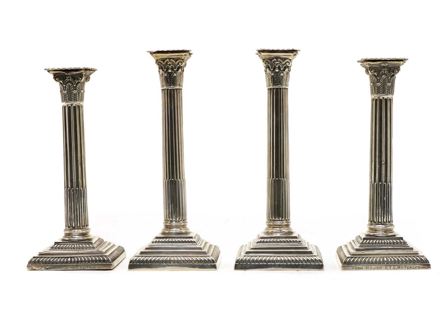 Lot 1 - Two pairs of similar Victorian silver pillar candlesticks