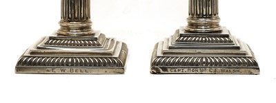 Lot 1 - Two pairs of similar Victorian silver pillar candlesticks