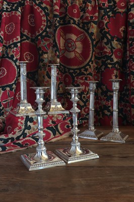 Lot 497 - A pair of Edwardian silver-plated neoclassical candlesticks