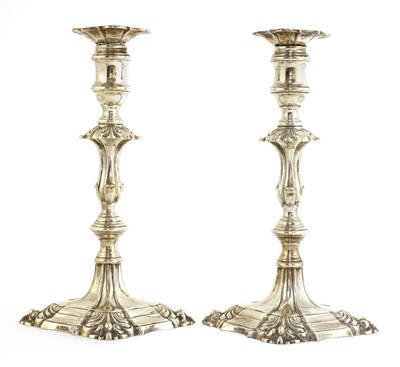 Lot 503 - A pair of George II-style silver candlesticks