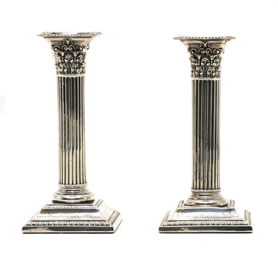 Lot 39 - A pair of modern dwarf silver pillar candlesticks