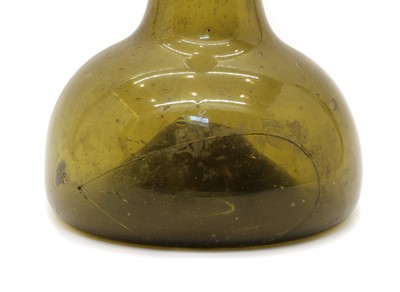 Lot 105 - An 18th century green glass bottle