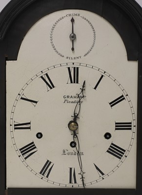 Lot 598 - An ebonised musical bracket clock and bracket
