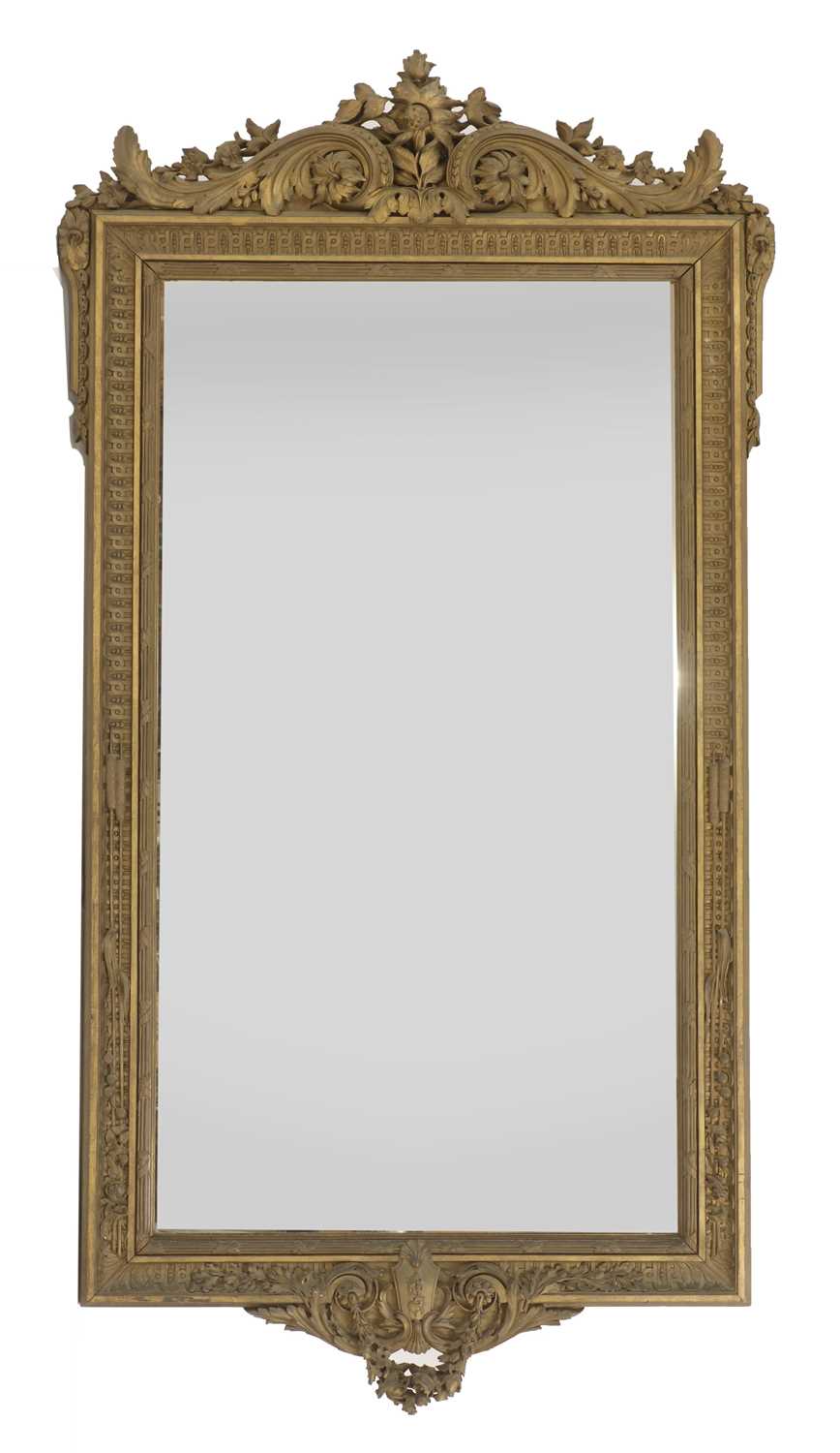 Lot 445 - A large carved giltwood pier mirror