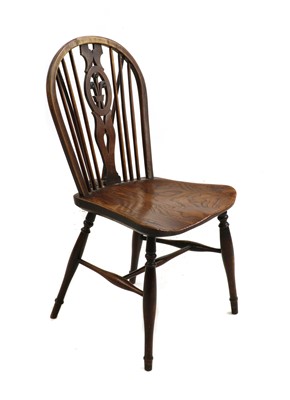 Lot 427 - A fruitwood and elm Windsor single chair