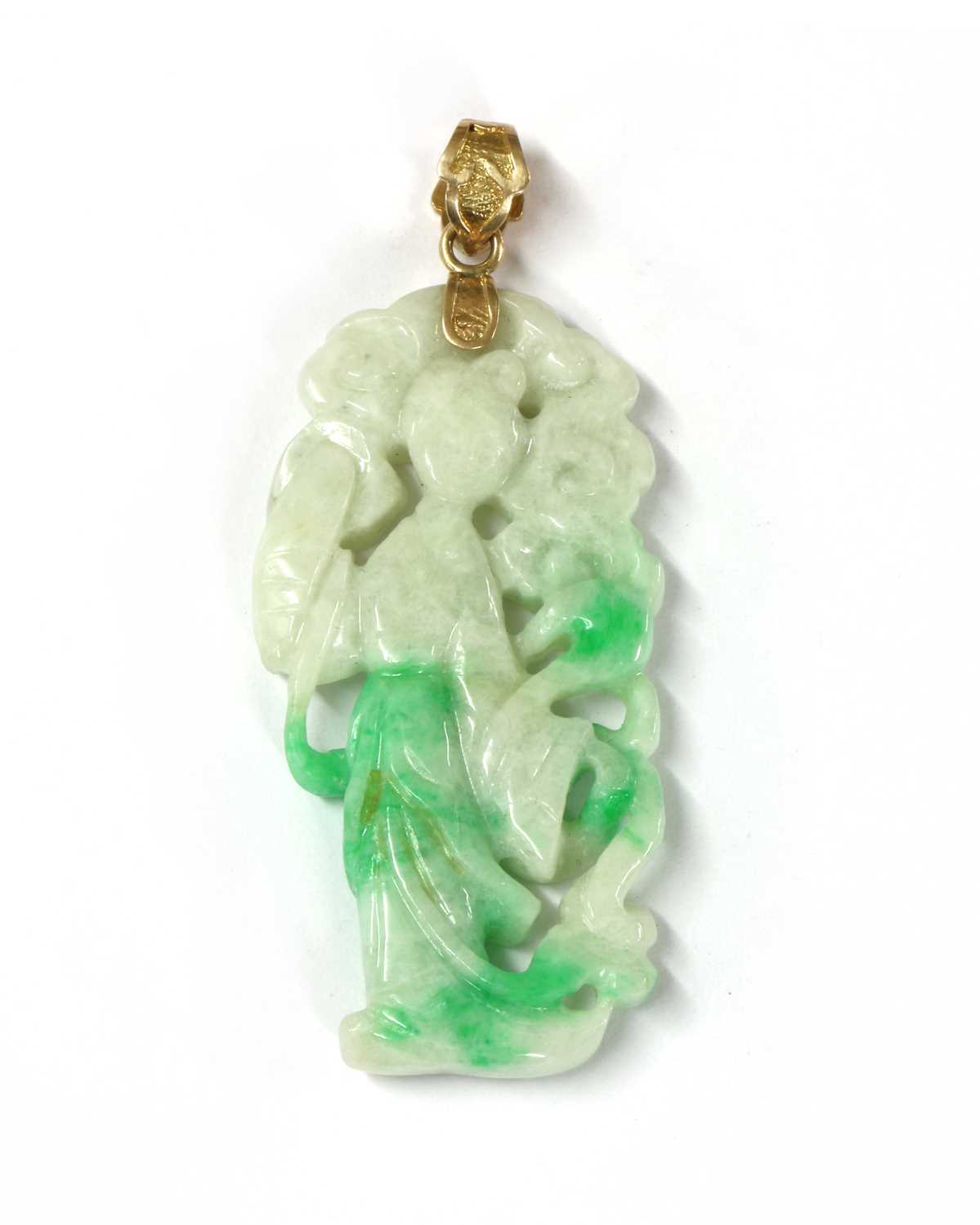 Lot 148 - A carved jade pendant