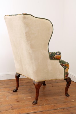 Lot 670 - A Queen Anne wingback armchair