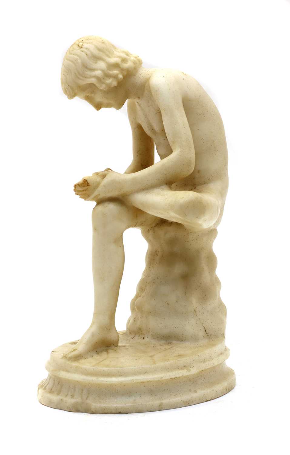 Lot 66 - A marble sculpture of Spinario