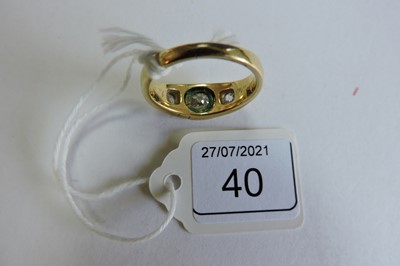 Lot 40 - A Victorian three stone graduated diamond and enamel ring, c.1860