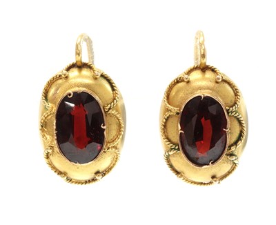 Lot 167 - A Russian gold garnet set brooch and earrings suite