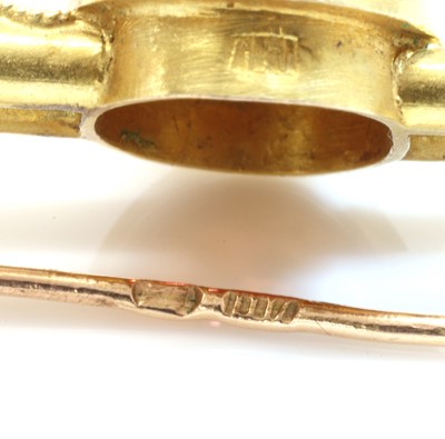 Lot 167 - A Russian gold garnet set brooch and earrings suite