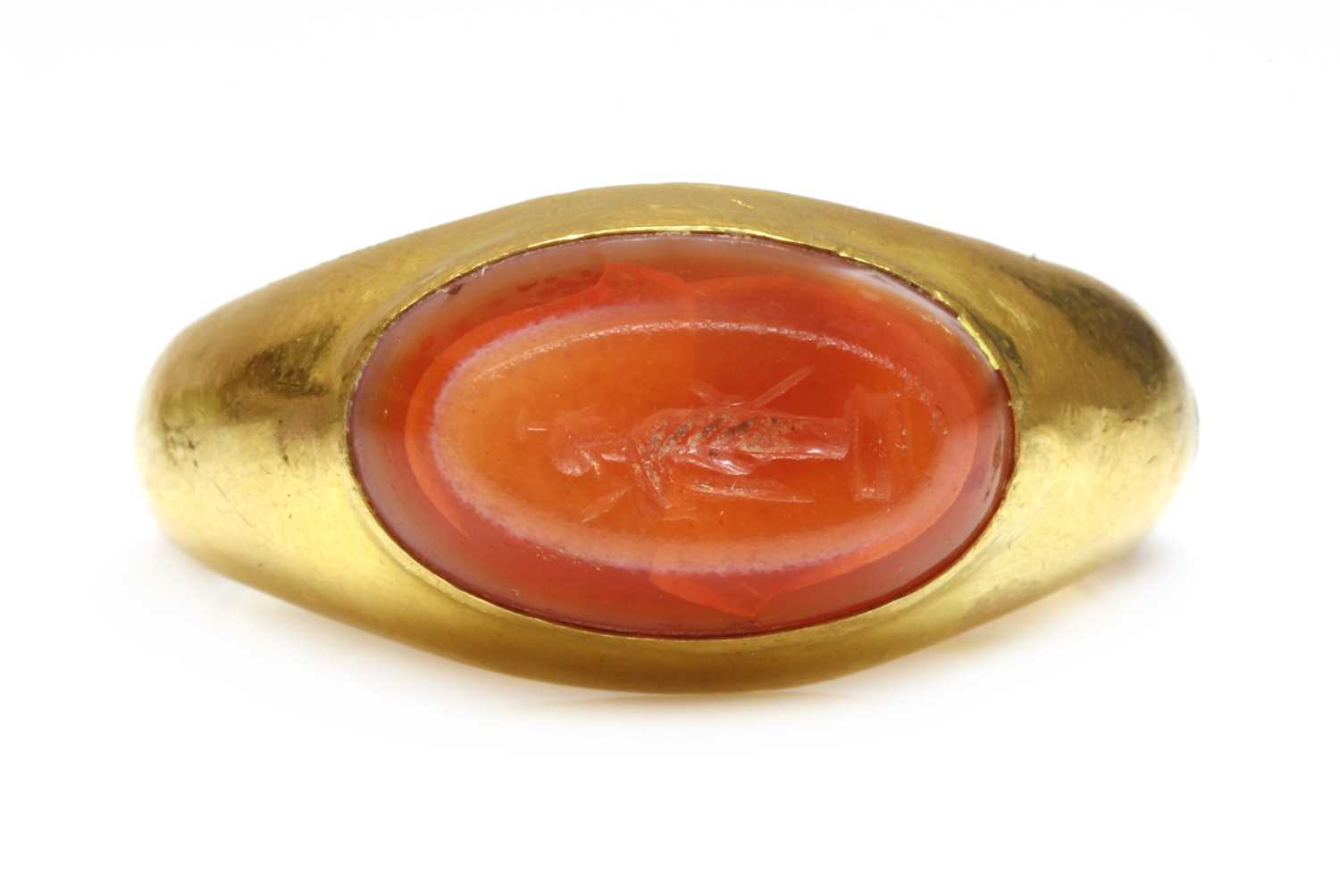 Lot 2 - A Roman hollow gold hardstone intaglio ring