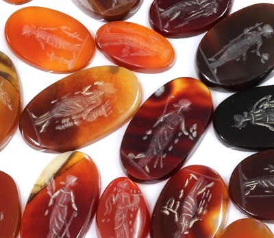 Lot 219 - A large quantity of oval carved cornelian intaglios