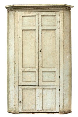 Lot 674 - A large George III painted pine corner cupboard