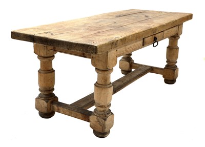 Lot 660 - A scrubbed oak refectory table