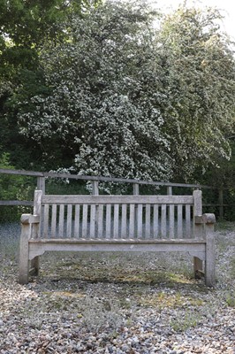 Lot 791 - A large teak garden bench