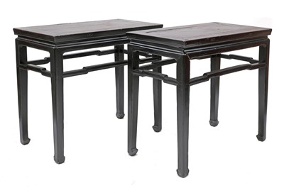 Lot 489 - A pair of Chinese ebonised and parcel-gilt hardwood low tables