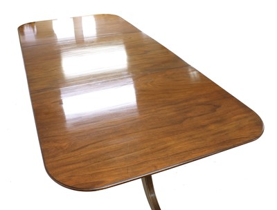 Lot 371 - A Regency-style mahogany triple pedestal dining table