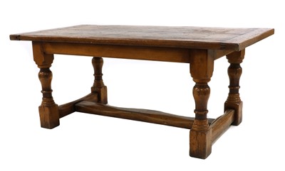 Lot 425 - An oak refectory table