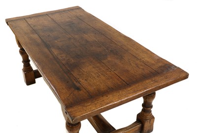 Lot 425 - An oak refectory table