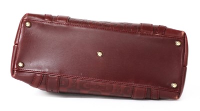 Lot 269 - A Gucci red leather horse-bit shoulder bag