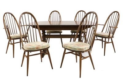 Lot 378 - An Ercol dining suite