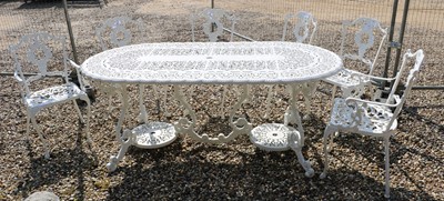 Lot 469 - A Victorian style garden dining suite