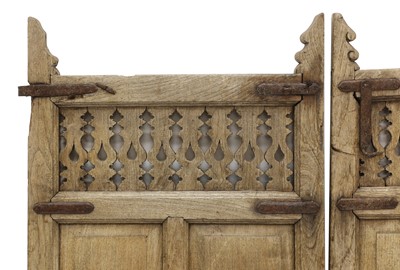 Lot 545 - A pair of Indian painted teak and wrought iron doors