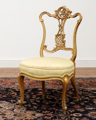 Lot 469 - A French Louis XV-style giltwood salon chair