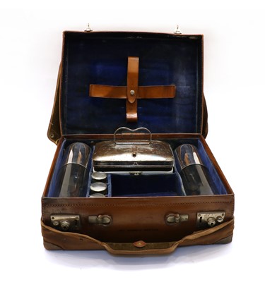 Lot 163 - A leather cased picnic set