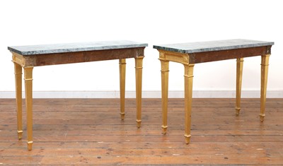 Lot 8 - A pair of giltwood console tables in the manner of Robert Adam