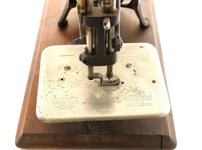 Lot 181 - A Wilcox & Gibbs sewing machine