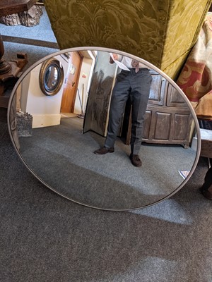 Lot 596 - A convex wall mirror
