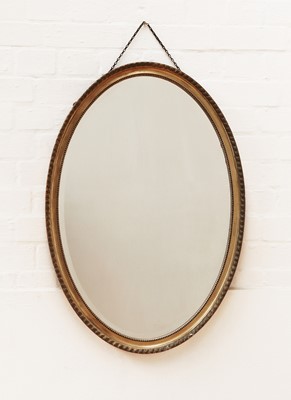 Lot 765 - A George III-style oval wall mirror