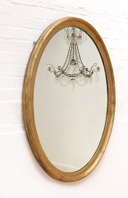 Lot 183 - A George III-style oval wall mirror