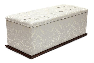 Lot 594 - A silk-upholstered ottoman