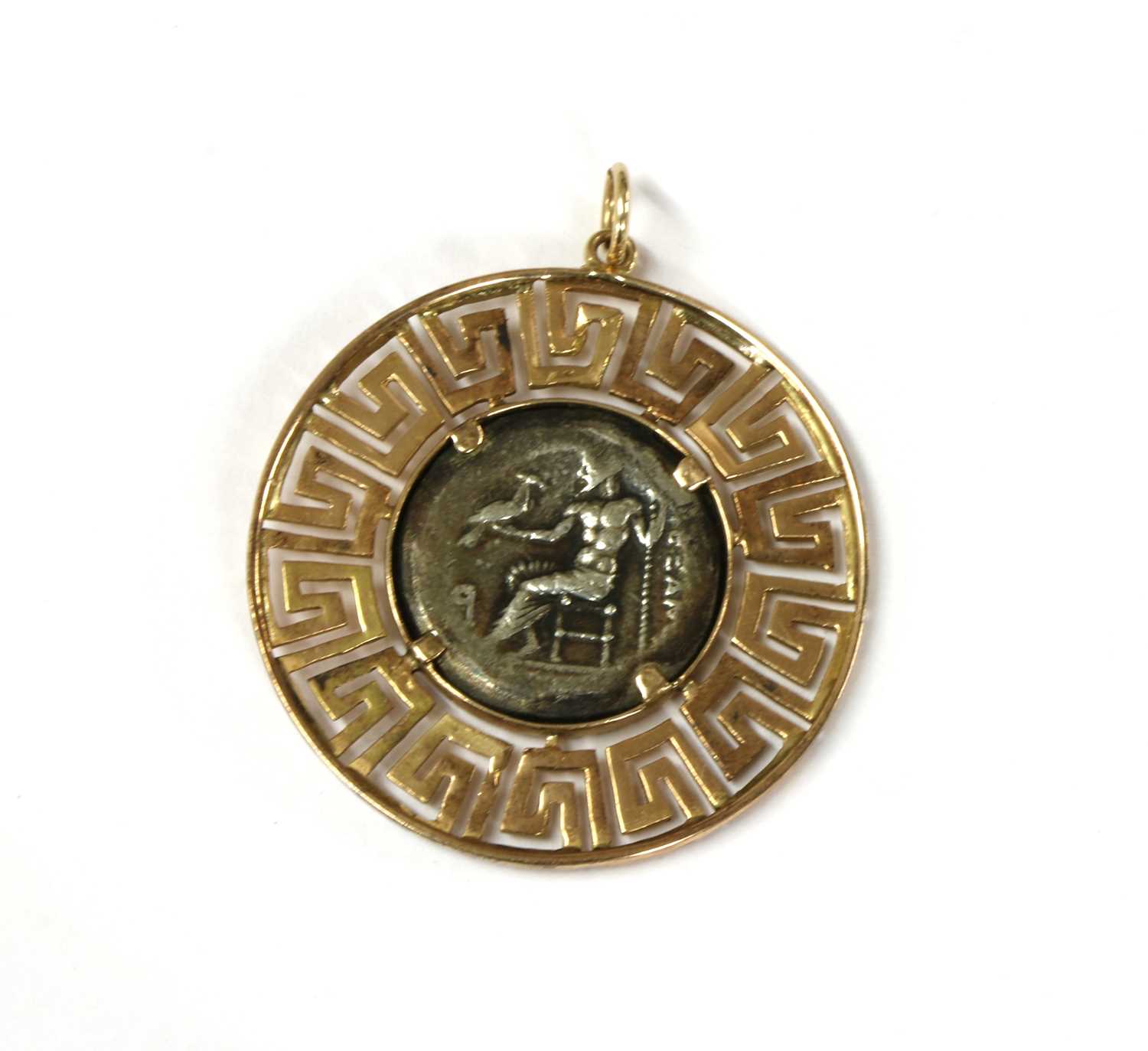 Lot 87 - A gold and silver pendant