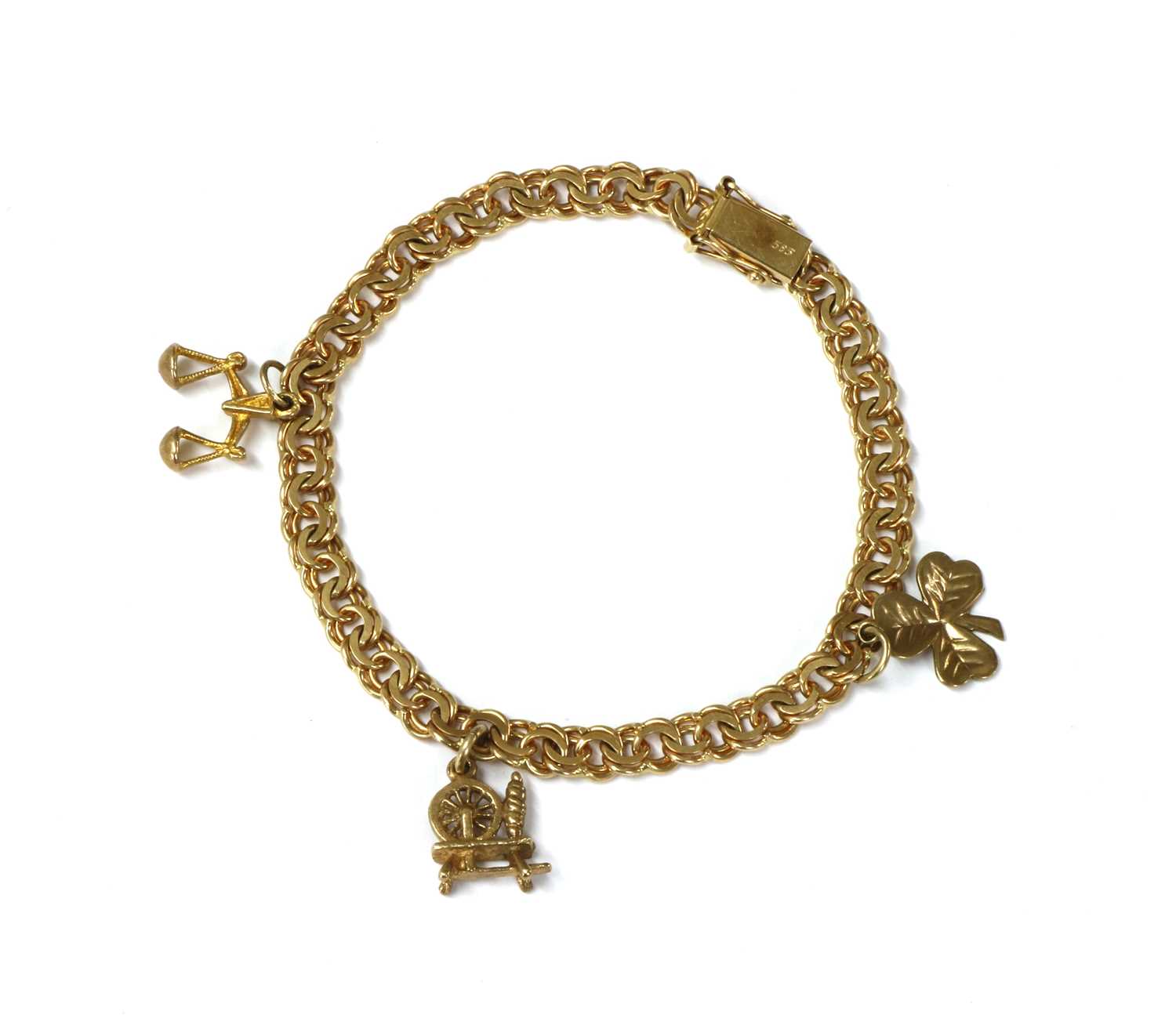 Lot 99 - A gold charm bracelet