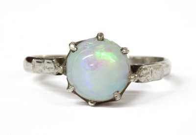 Lot 176 - A white gold single stone opal ring