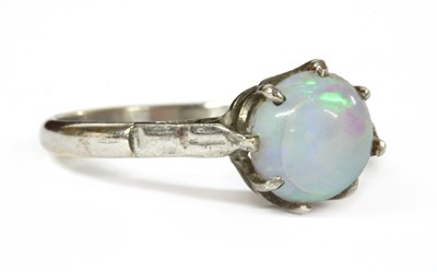 Lot 176 - A white gold single stone opal ring
