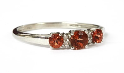 Lot 160 - An 18ct gold gem-set and diamond ring