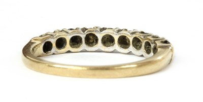 Lot 126 - A 9ct gold sapphire and diamond half eternity ring