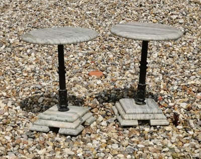 Lot 484 - A pair of small marble and cast iron tables